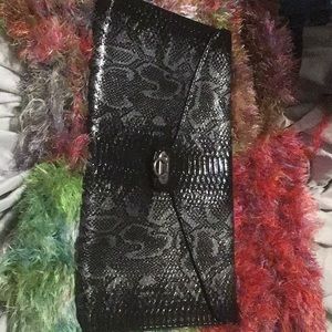Women snakeskin clutch